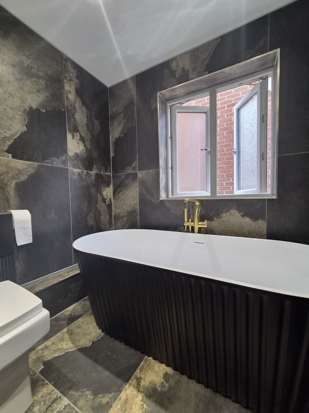 Bathroom renovation in Wembley, HA9 — after, full replumb and layout redesign